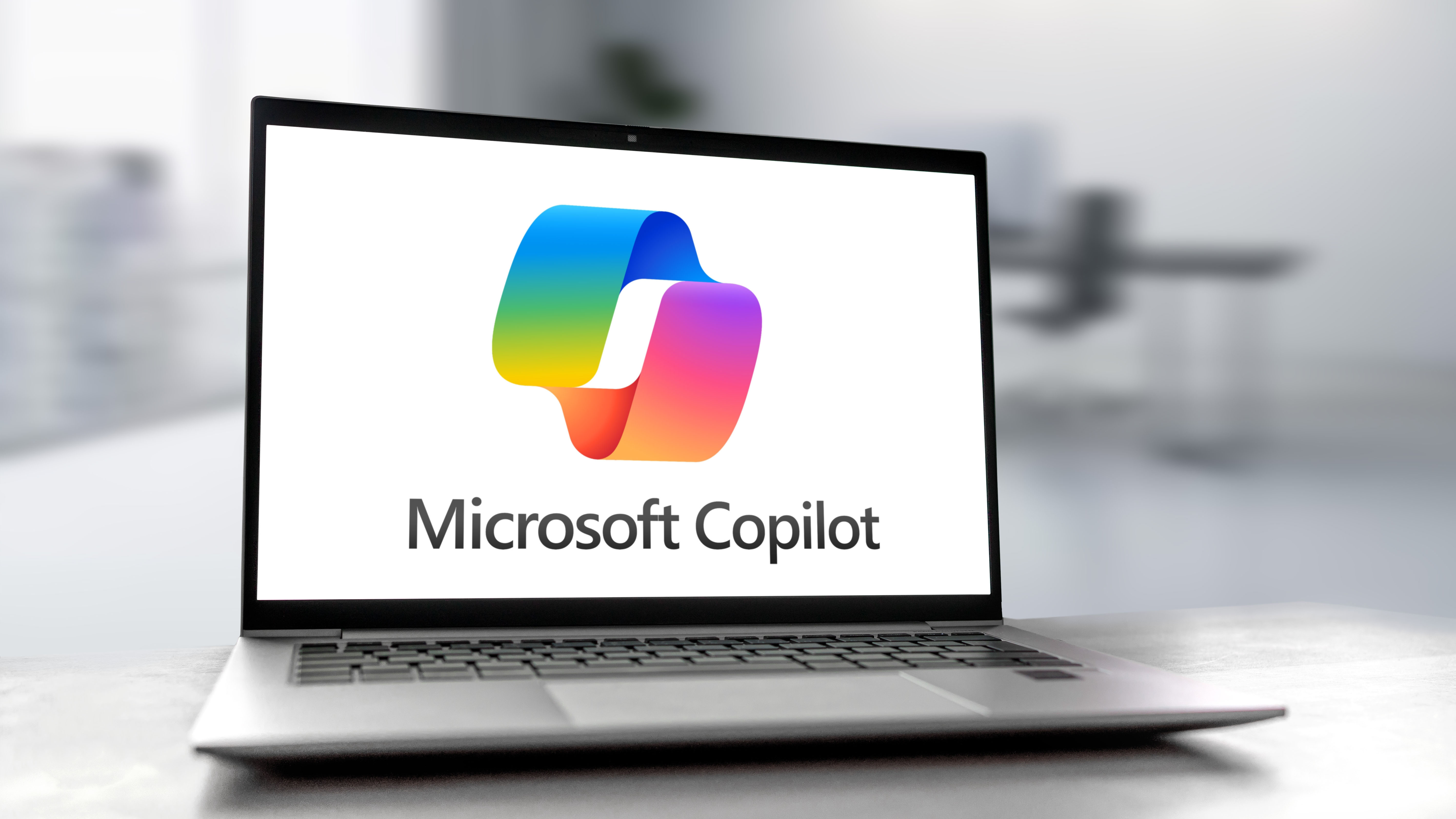 Professional using AI productivity software at work